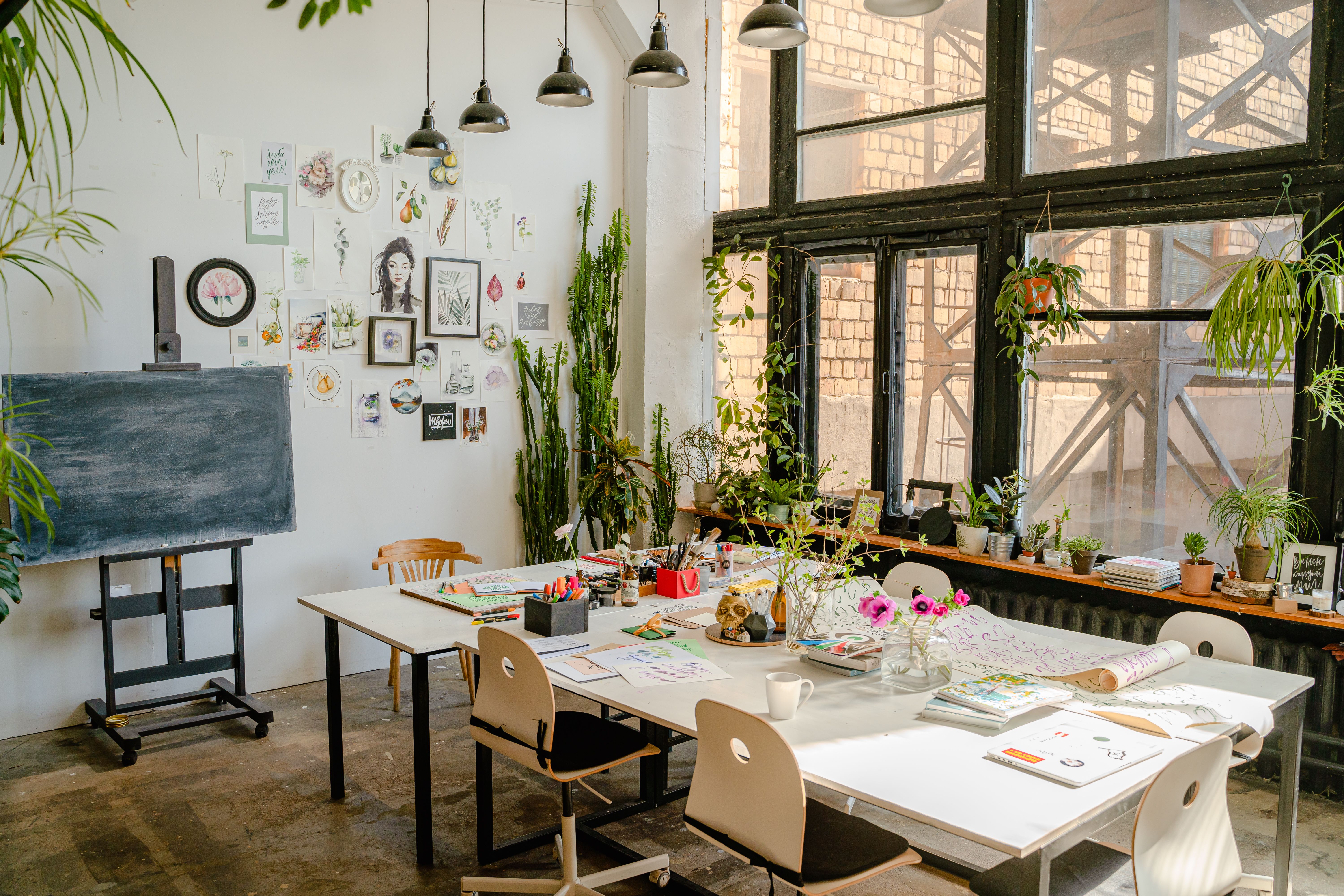 Guests taking part in a creative workshop at an open-air Bali villa