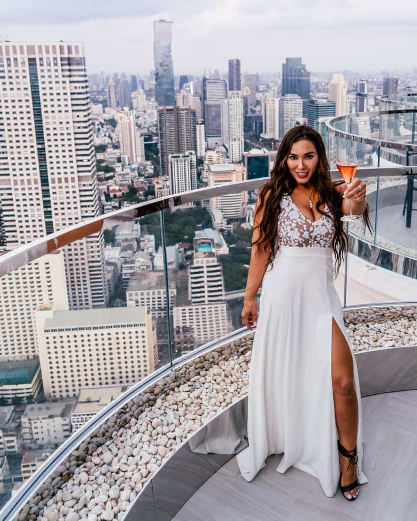 Isabella standing on balcony in NYC