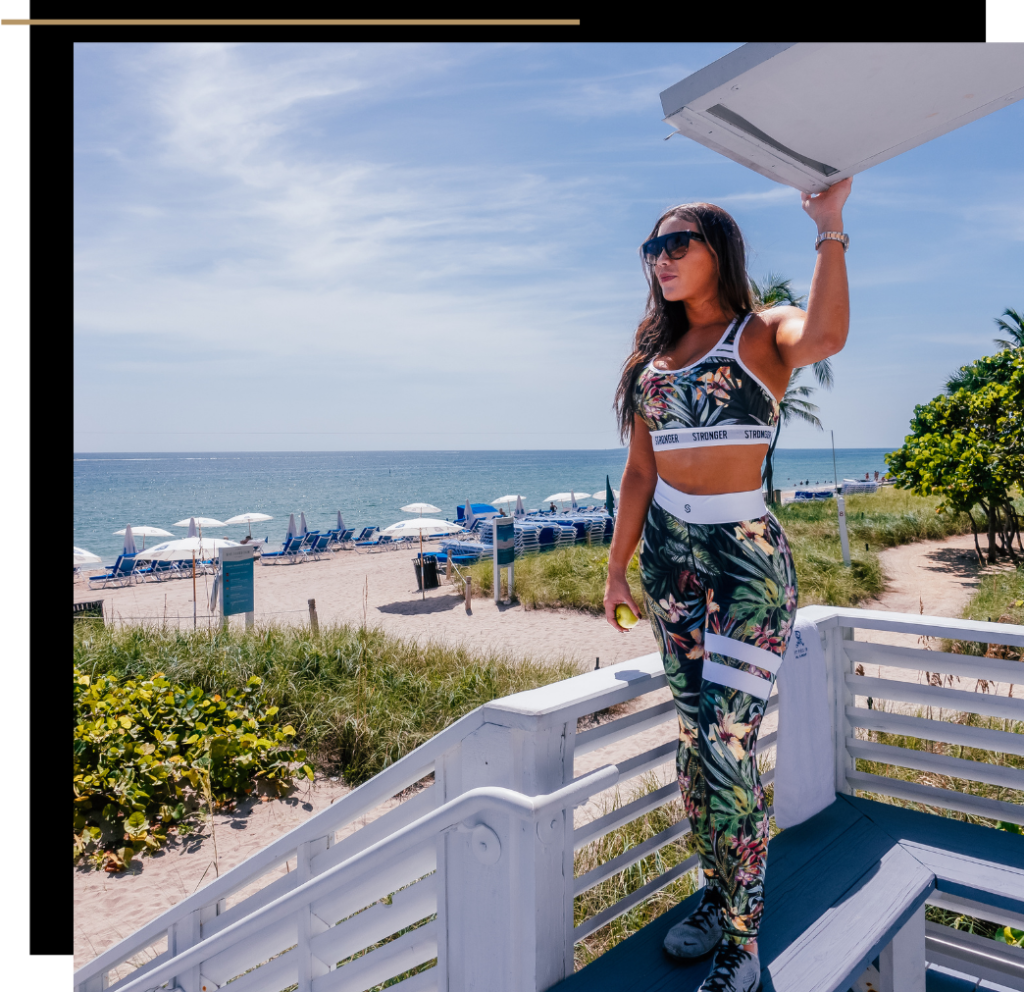 Isabella standing at the lifeguard station at St Regis Bal Harbour