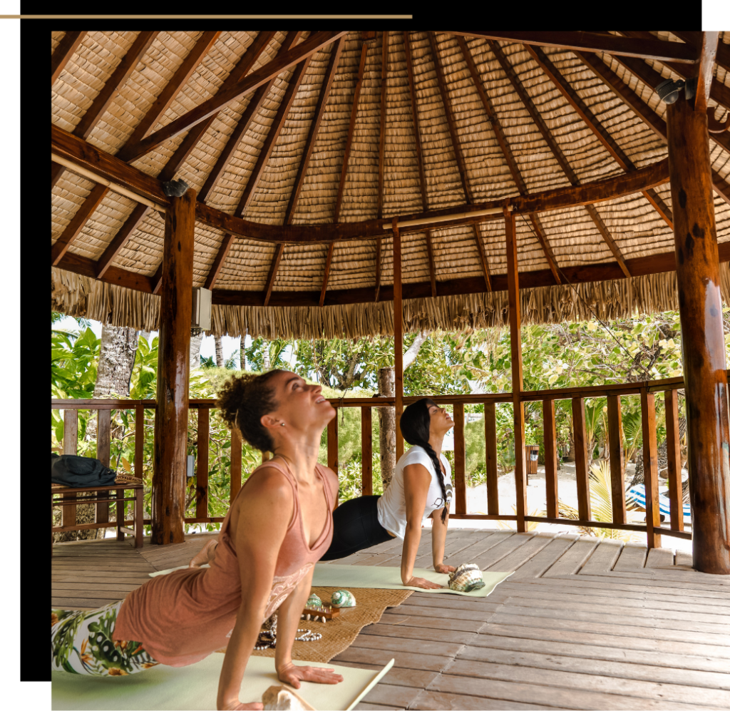 Isabella and a yoga instructor working out 