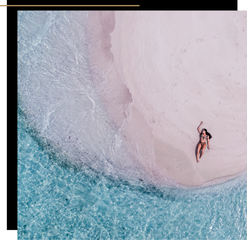 Isabella on a sand bank in The Maldives