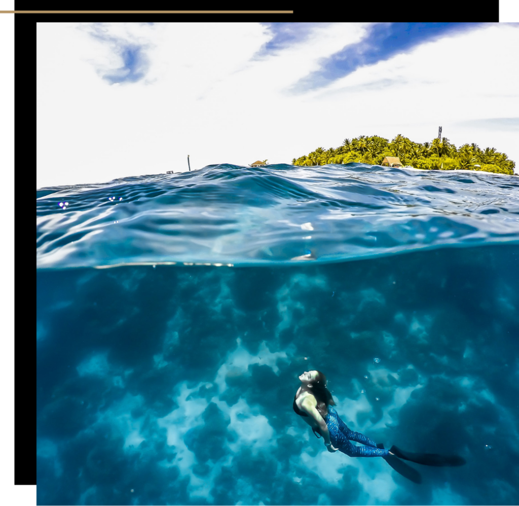 A woman free diving 