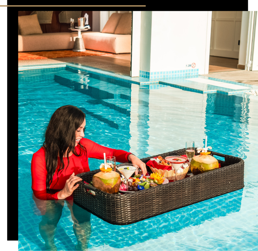 Isabella enjoying a floating breakfast in the Emerald Maldives pool 