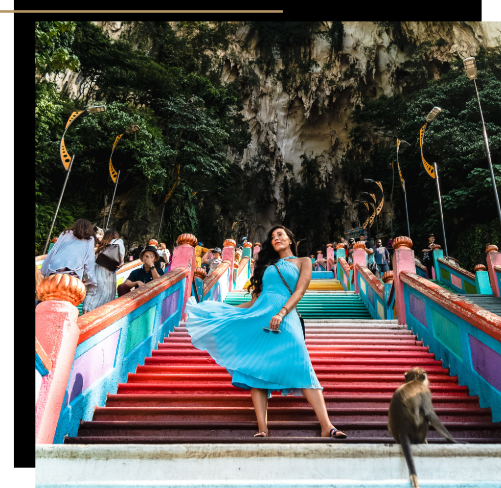 Isabella in front of the Batu caves in Kuala Lumpur 