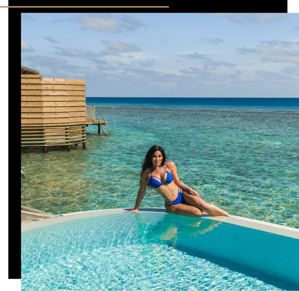 Isabella in a blue bikini at Soneva Fushi Maldives