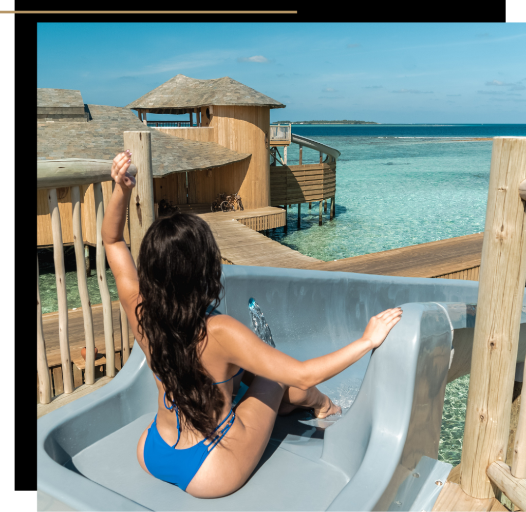 Isabella at the top of the sea slide at Soneva Fushi Maldives