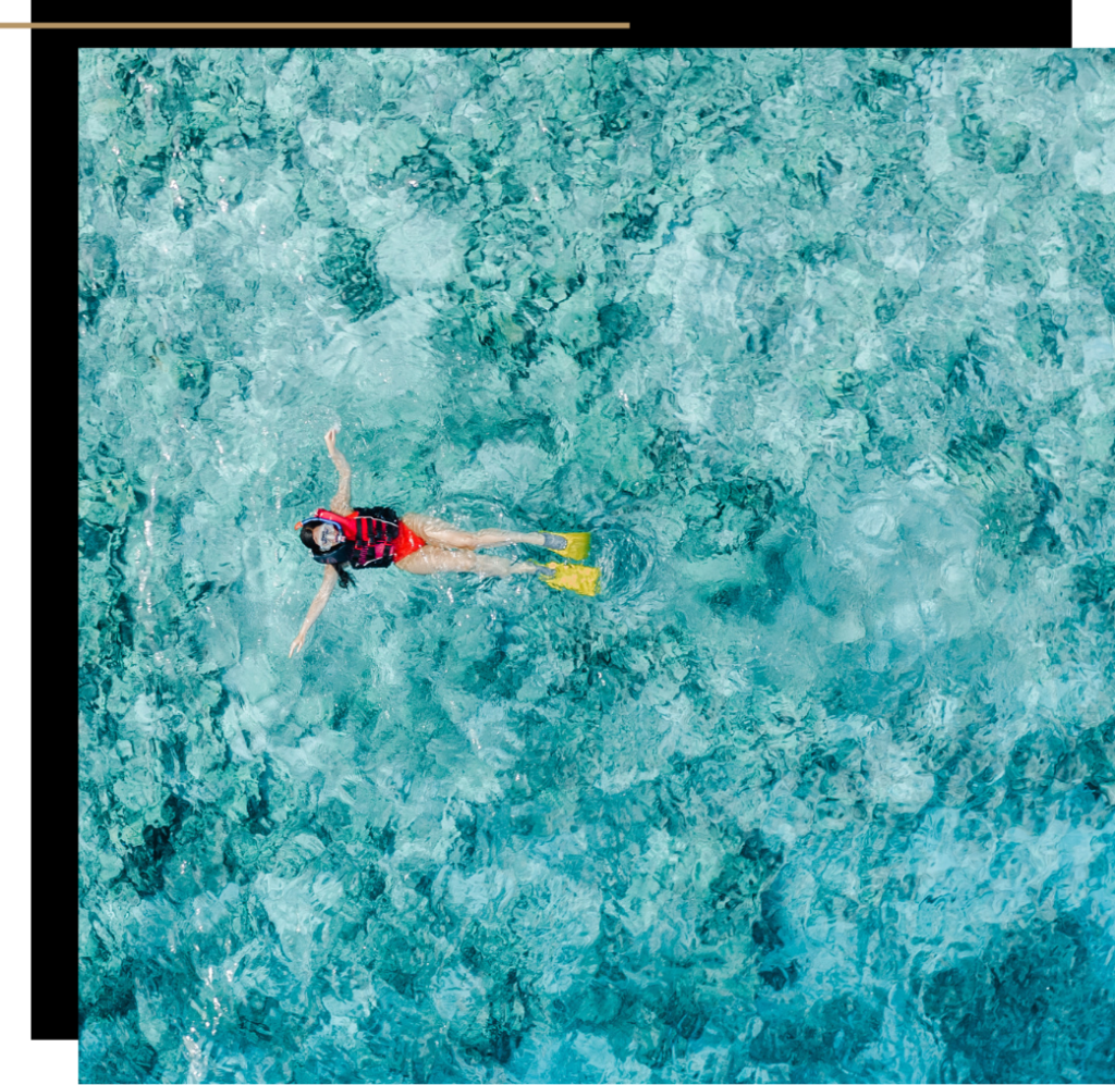 Isabella snorkelling at Soneva Fushi