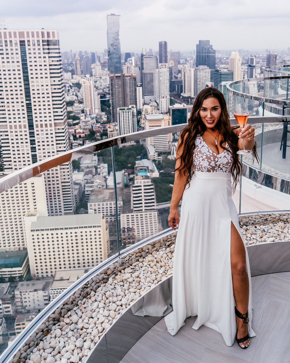 Isabella holding rose champagne at Lebua Bangkok